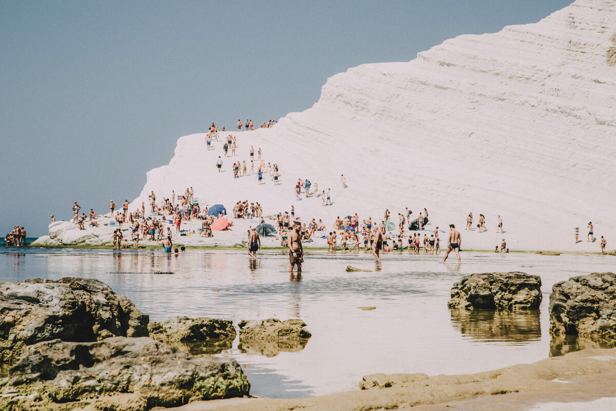 Scala di turchi beach with crowd of people in Agrigento sicily
